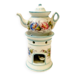 Tisanire en porcelaine polychrome a dcor floral xx sicle