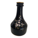 Vase noir avec fleurs Vase noir avec fleurs