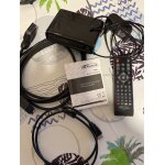 Dcodeur takara avec cbles , tlcommande et mode d'emploi.