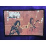 Kiss. patch avec 2 photo live lick it up. sous plastique. 13 x 8. 5 cm. lot 425