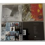 Lot de 4 cd  ; groupes rock ; u2 fugees nirvana texas