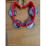 Petit tambourin en plastique rouge