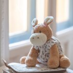 �ne en peluche botton fleurs