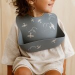 Bavoir en silicone � poche aviateur