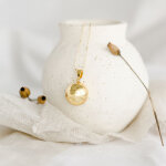 Bola de grossesse origine perle cha�ne (or jaune 18 carats)