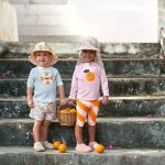 Chapeau r�versible anti - uv orange (3 - 6 mois)