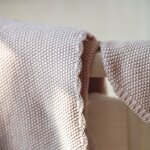 Couverture tricot b�b� rose (75 x 100 cm)