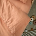 Drap housse satin peach (70 x 140 cm)