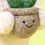 Peluche lapin cream avec plante (31 cm)