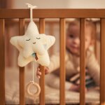 Peluche musicale star ivory
