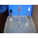 6 flacons de parfum vides.