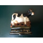 Ancien cale porte fonte sculpture vache Ancien cale porte fonte sculpture vache