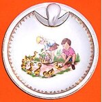 Assiette chauffante ancienne en porcelaine de limoges