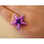Bague réglable etoile de mer rose et violette Bague réglable etoile de mer rose et violette