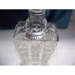 Bouteille ancienne en verre avec ecusson et bouchon a vis bisquit cognac 3 etoiles
