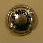 Capsule de champagne argent avec ecriture noire Capsule de champagne argent avec ecriture noire