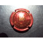 Capsule de champagne a. bergere. fond rouge.