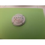 Superbe capsule du champagne haton ecriture noire et roge sur fond blanc