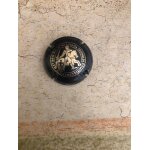 Capsule de champagne  taittinger  noir