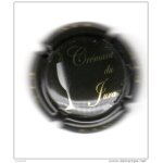 Capsule de cr�mant du jura, ecriture dor�e, sous fond noir, une flute.