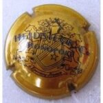 Capsule muselet de champagne heidsieck c monopole en bleu sur fond or Capsule muselet de champagne heidsieck c monopole en bleu sur fond or