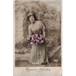 Carte postale ancienne, france, voeux, bonne ann�e, femme dans un jardin, bouquet de fleurs - oblit�ration ...