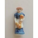 F�ves brillante c�ramique de collection santon de cr�che , femme aux fleurs fleuriste robe bleu
