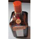 Flacon vide ayant contenu de la liqueur cointreau l'unique - verre brun - 0. 70l - avec toutes ses etiquettes ...