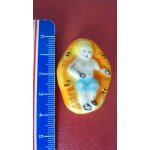 Grande fve santon = le petit jsus ( longueur de 38 mm sur 28 mm)