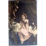 Heureux no�l - petite fille au pied du sapin