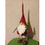 Lutin de no�l en fer forg�. avec ressort interne qui permet le mouvement du personnage. en tr�s bon etat. ...