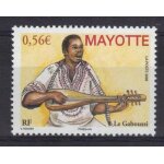Mayotte 2009 : instrument de musique traditionnel : le gaboussi : chanteur avec gaboussi - timbre multicolore ...