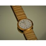Montre (unisexe) marque cyma (suisse) en or galvanis, quartz - vintage: periode 1980 - 1990