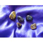 Oeil de tigre. 5 pierres roul�es dont la plus grande fait 3. 7 cm de long. magnifiques couleurs, pierres ...