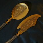 Pelle et serpe a glace en argent et laiton