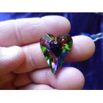Pendentif coeur en cristal strass a facettes aux reflets jaune, bleu, vert, violet - dos argent. 2. ...