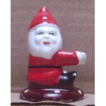 P�re noel assis porte bougie, serviette, invitation . . .