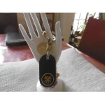 Porte cl�s anneau dor� pendentif fa�on cuir signe gemeaux