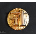 Presse papier en metal dore representant les cheminees du paquebot  ; france ;