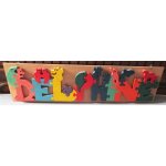 Puzzle prnom delphine coll sur une plaque en bois - lettres colores avec des petits animaux - 64x17cm ...