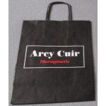Sac papier publicitaire - fond noir avec bandeau arcy cuir maroquinerie - 2 faces identiques - 2 anses ...