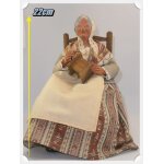 Santon provenal - grand - mre assise avec un moulin a caf - ange monleau - 22cm