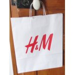 Simple sac papier recycable publicitaire - blanc avec grandes lettres h & m en rouge - 2 faces identiques ...