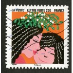 Timbre oblitr provenant du carnet bonne anne ! enfant embrassant sa mre sous le gui, la poste, lettre ...