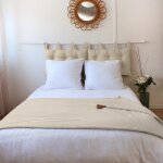 Edredon  pompons matelass 100 % coton ecru 190 x 90 cm