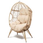 Fauteuil ?uf sur pied en r�sine beige effet rotin
