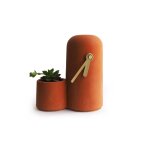 Horloge en bton terracotta aiguilles dores
