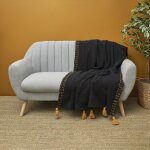 Jet de canap surpiqu noir et ambre avec pompons 130 x 170 cm