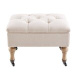Pouf coffre capitonné à roulettes en lin et coton écrus Pouf coffre capitonné à roulettes en lin et coton écrus