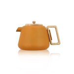 Théière en fonte jaune avec couvercle en bois 500ml Théière en fonte jaune avec couvercle en bois 500ml